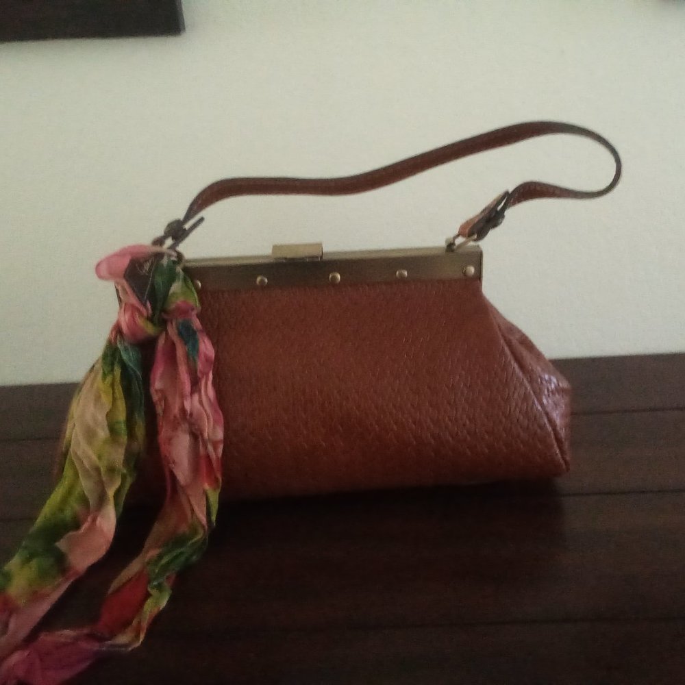 Patricia Nash brown leather frame bag.